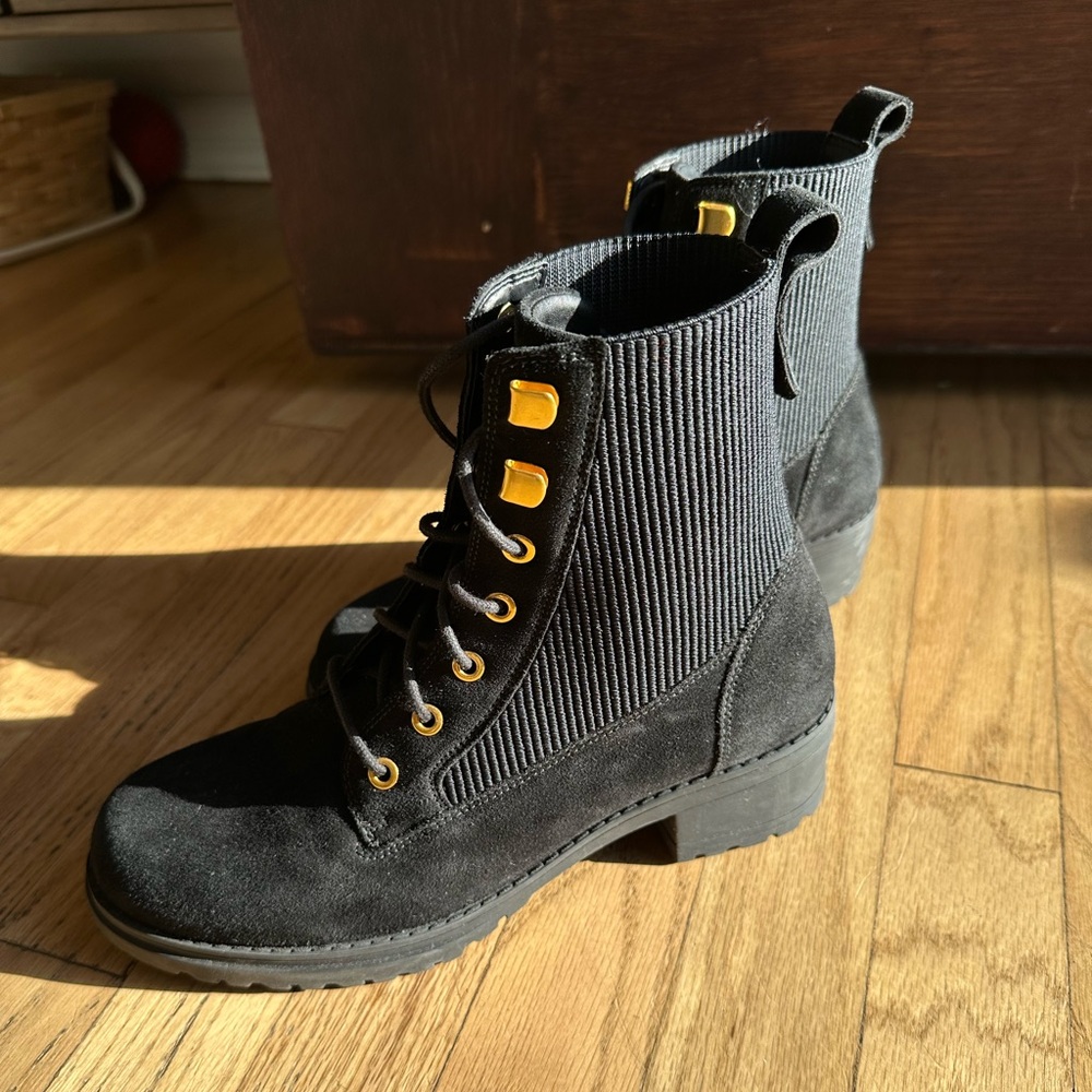 Cole Haan waterproof boot with gold details. Can dress up or down. Worn twice. ￼